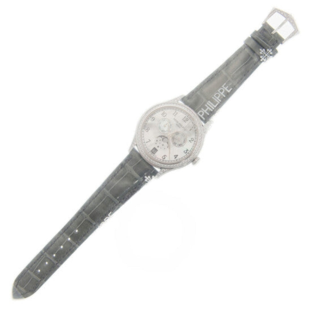 Watch with a gray strap and visible brand name on a white background