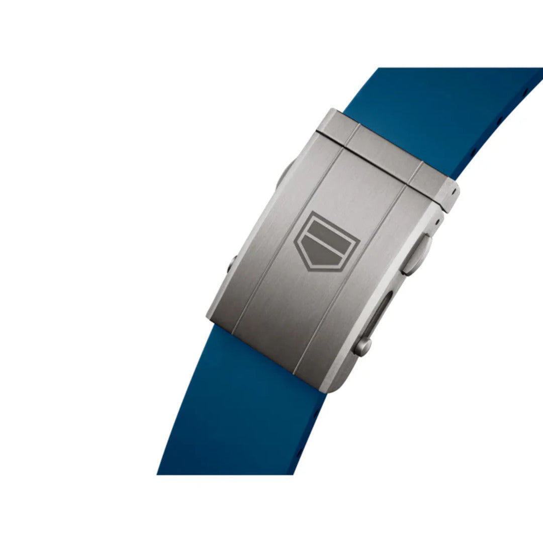 Close-up of a watch with a blue strap and silver buckle on a white background