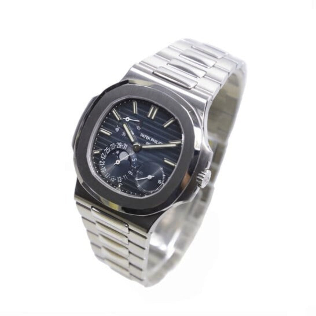 Silver watch with a detailed face on a white background