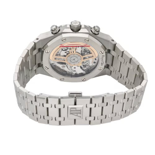 Silver watch with a detailed mechanical back on a white background