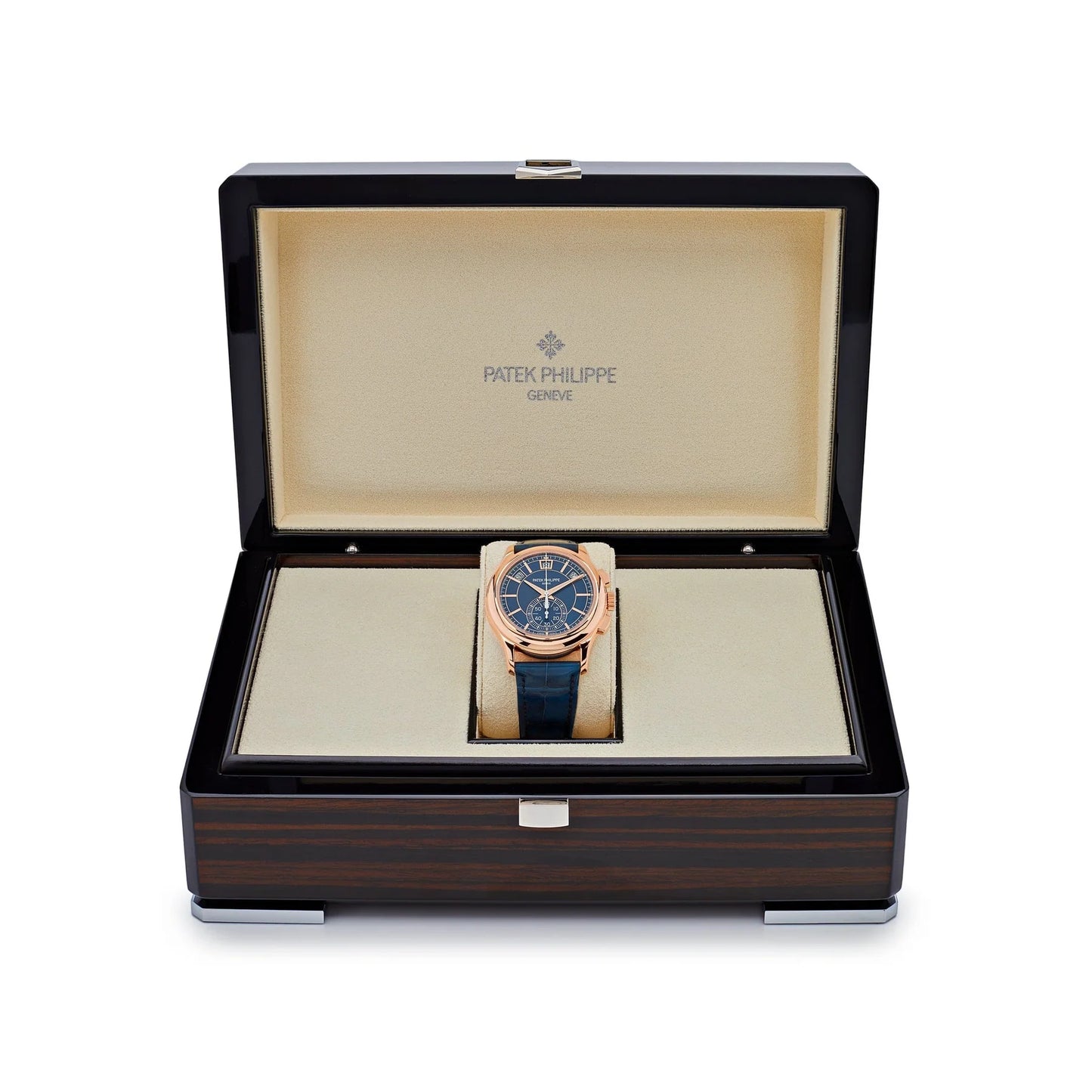 Patek Philippe watch in a wooden box on a white background