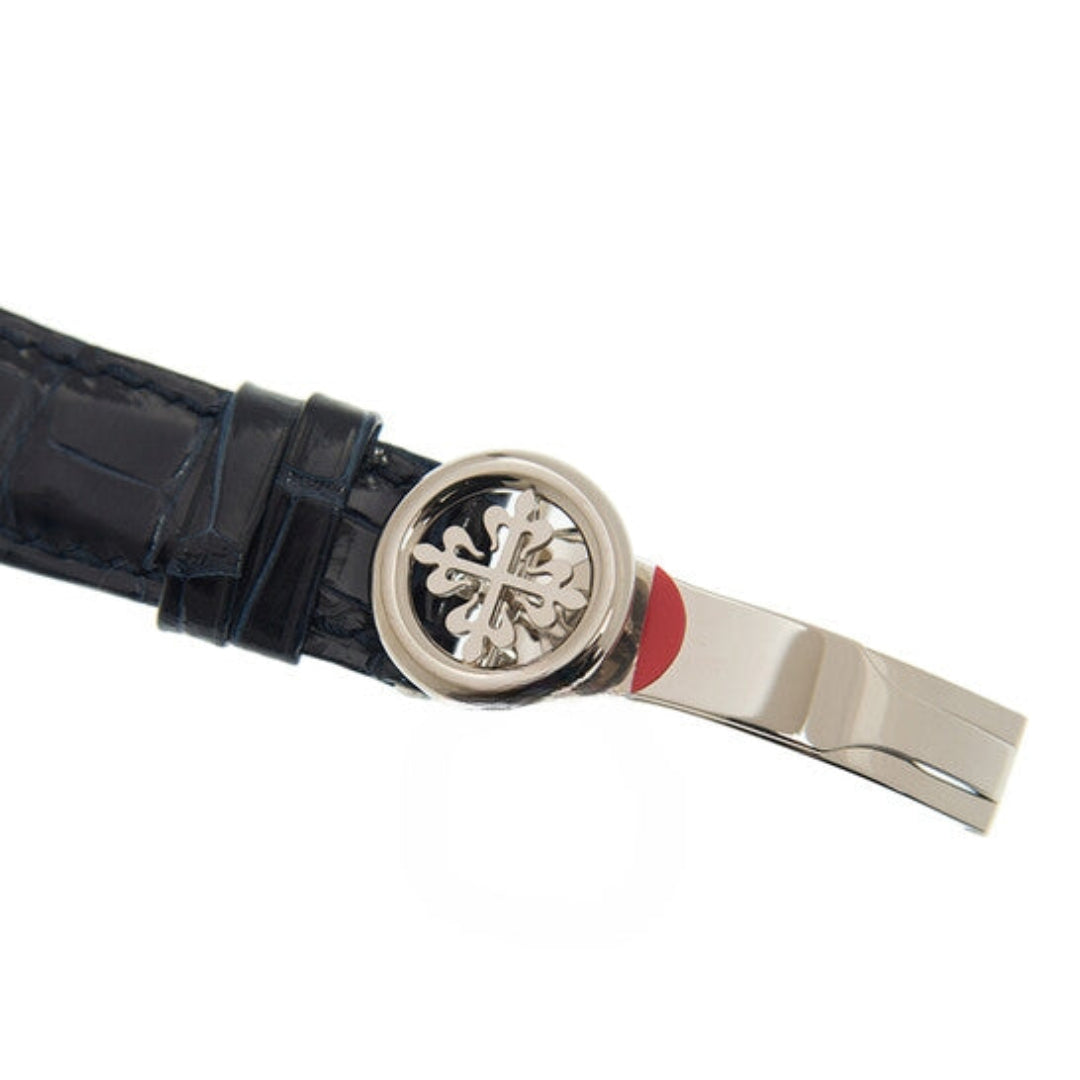Black leather strap with a silver clasp and red accent on a white background