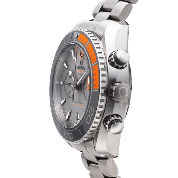 Silver watch with orange accents on a white background