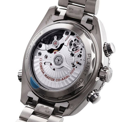 Close-up of a silver watch with visible Omega branding on a white background