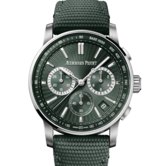 Watch with green strap and detailed face on a white background