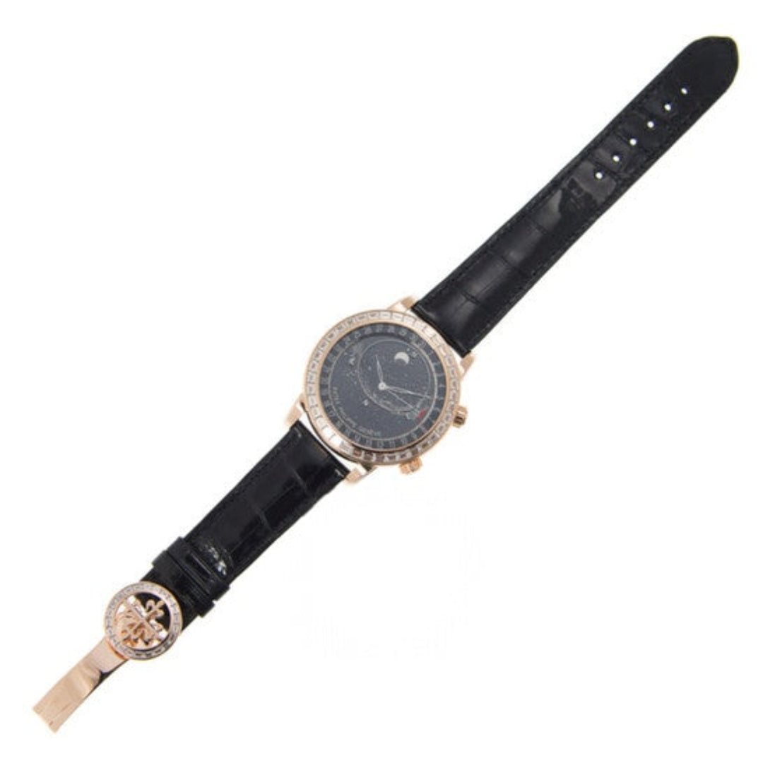 Luxury watch with black strap and detailed face on a white background