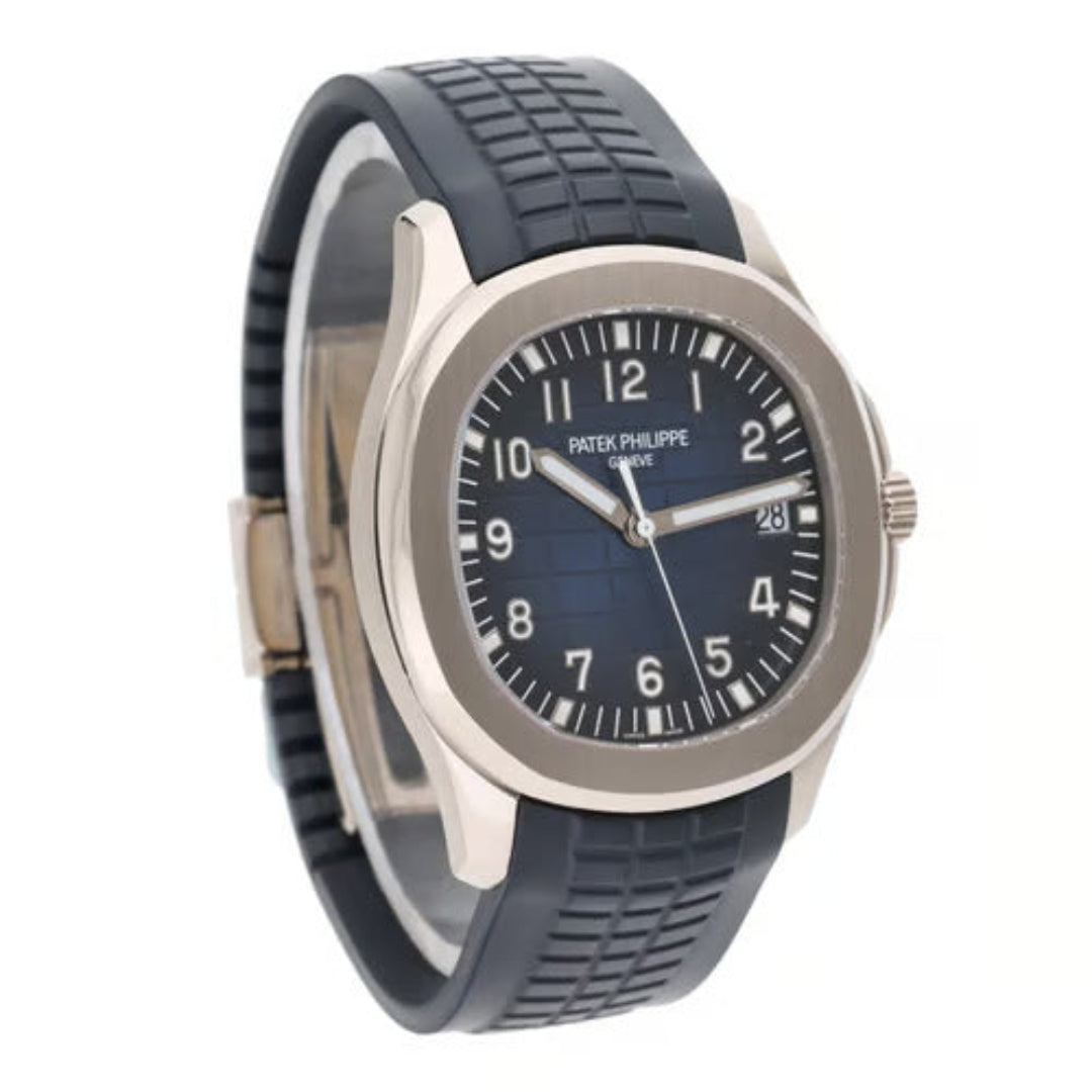 Patek Philippe watch with blue strap and black dial on a white background
