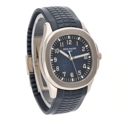 Patek Philippe watch with blue strap and black dial on a white background