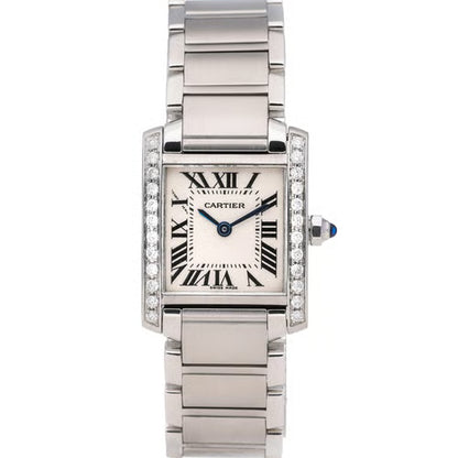 Cartier watch with a white face and diamond accents on a white background