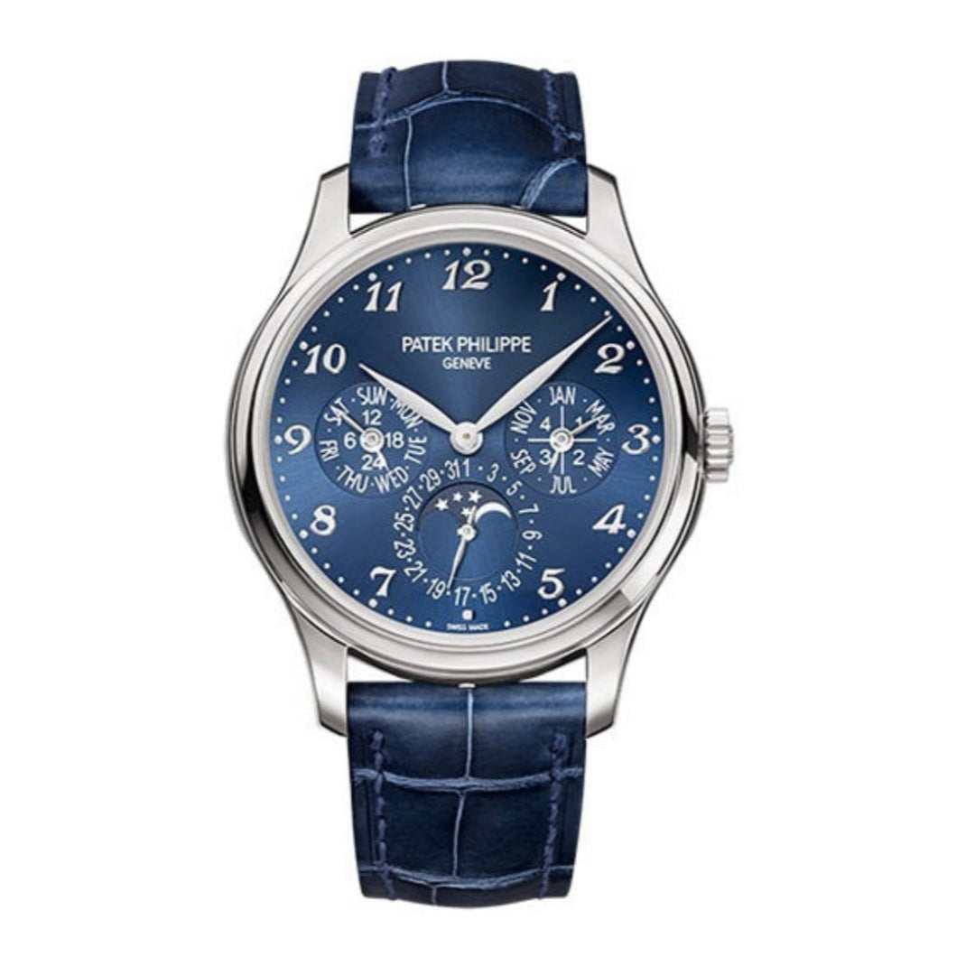 Patek Philippe watch with blue face and strap on a white background