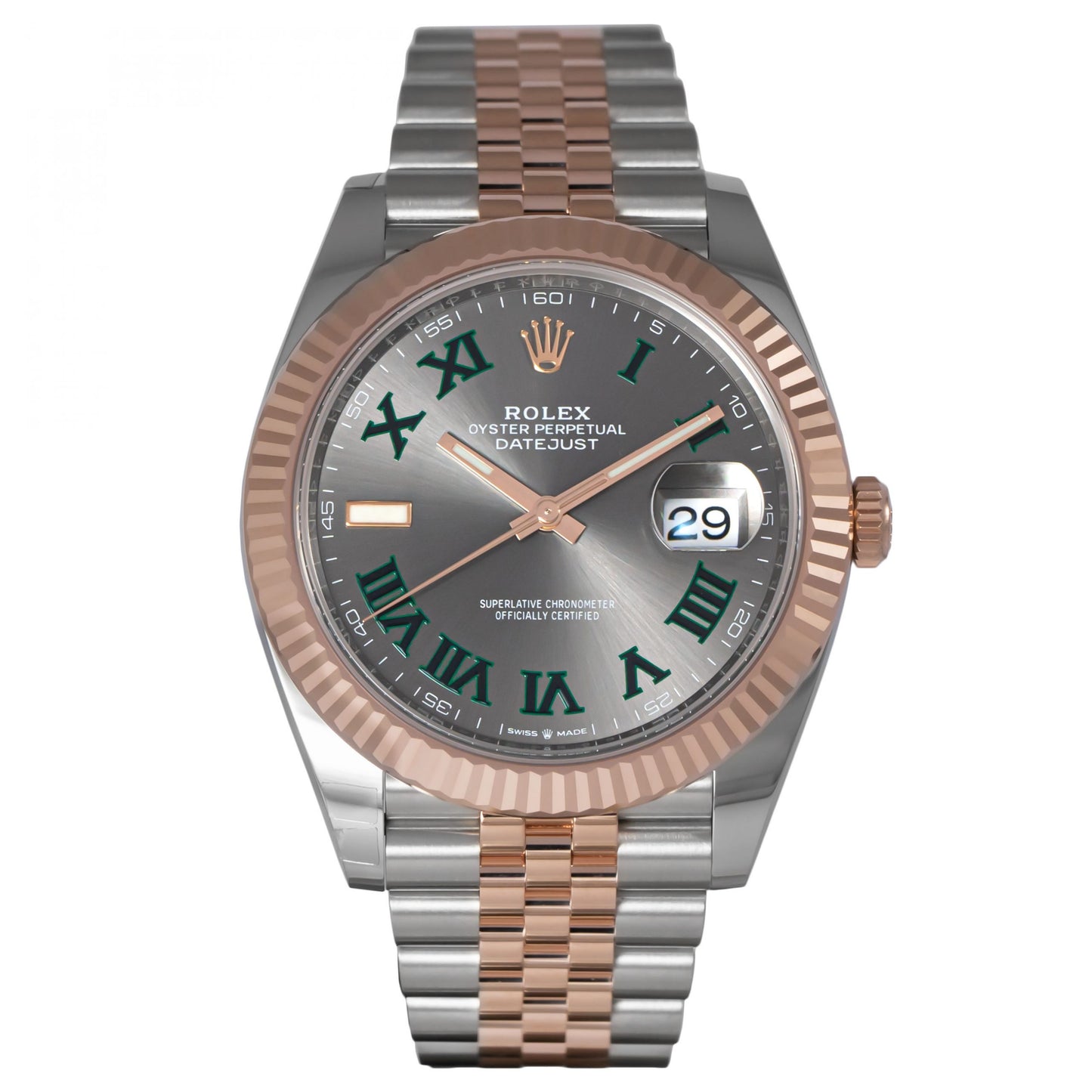 Rolex watch with silver and rose gold band on a white background