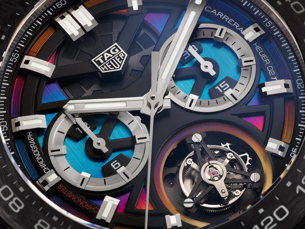 Close-up of a Tag Heuer watch with colorful inner workings
