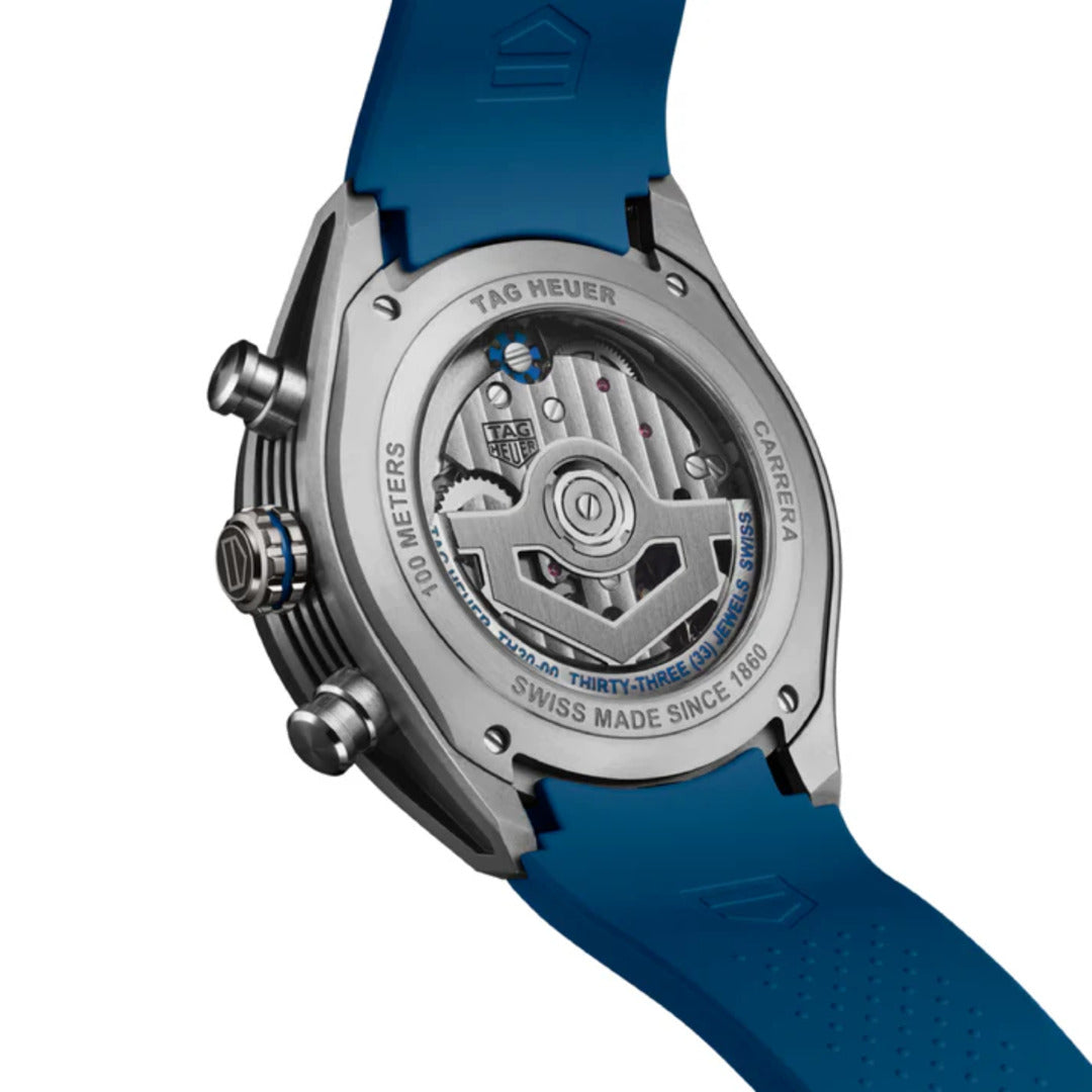 Back view of a Tag Heuer watch with blue strap and visible mechanical components.