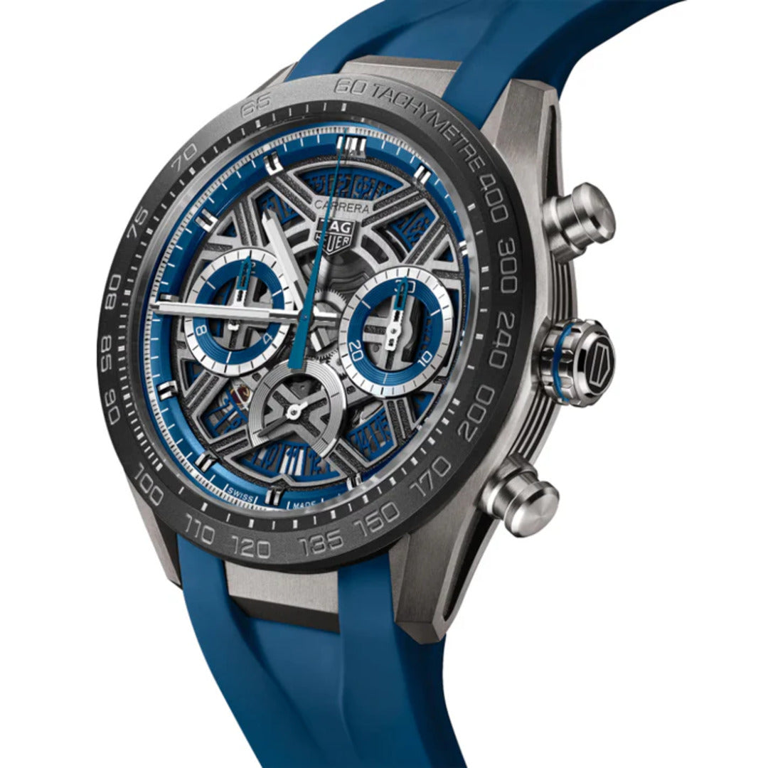 Luxury watch with blue strap and detailed face on a white background