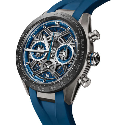 Luxury watch with blue strap and detailed face on a white background