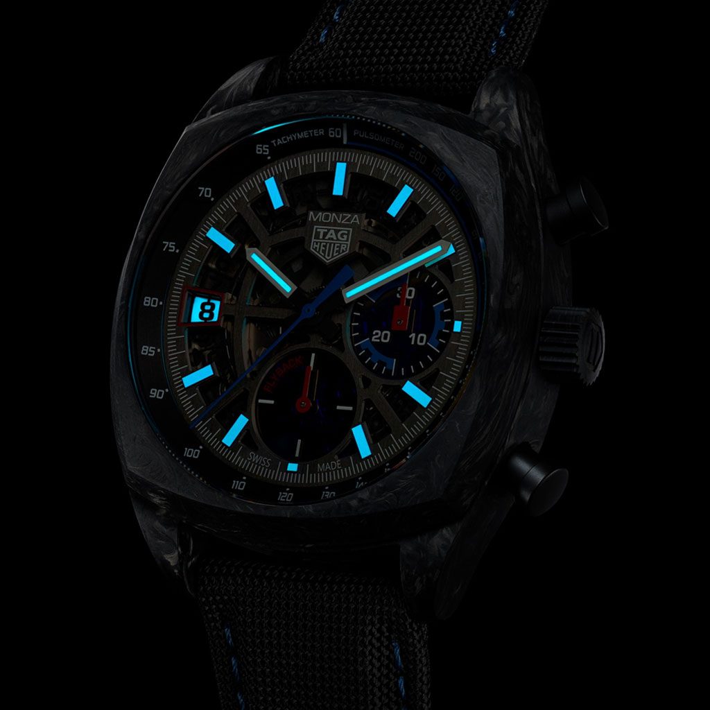 Black watch with blue glowing elements on a black background