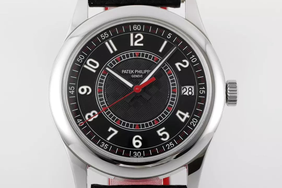 Wristwatch with black dial and red accents on a white background