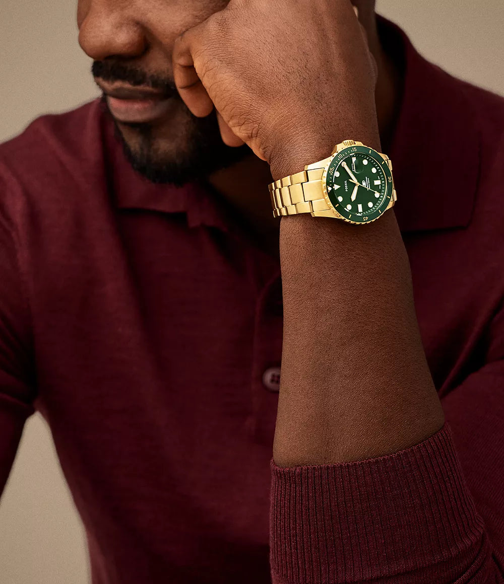 Fossil Blue Dive Quartz Men’s Watch FS6030 – 42mm Green Dial, Gold-Tone Stainless Steel Bracelet, Green Bezel, Date Display, 100M Water Resistance