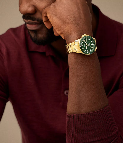 Fossil Blue Dive Quartz Men’s Watch FS6030 – 42mm Green Dial, Gold-Tone Stainless Steel Bracelet, Green Bezel, Date Display, 100M Water Resistance