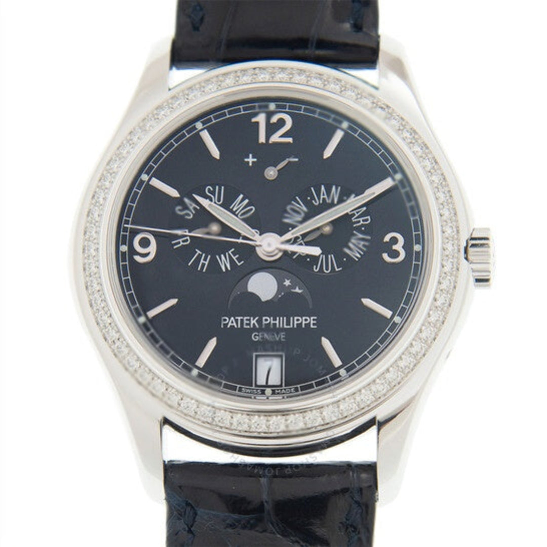 Patek Philippe watch with black dial and diamond-studded case on a white background