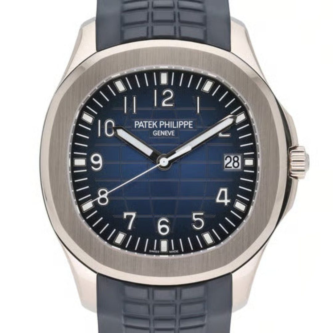 Patek Philippe watch with blue strap and blue dial on a white background