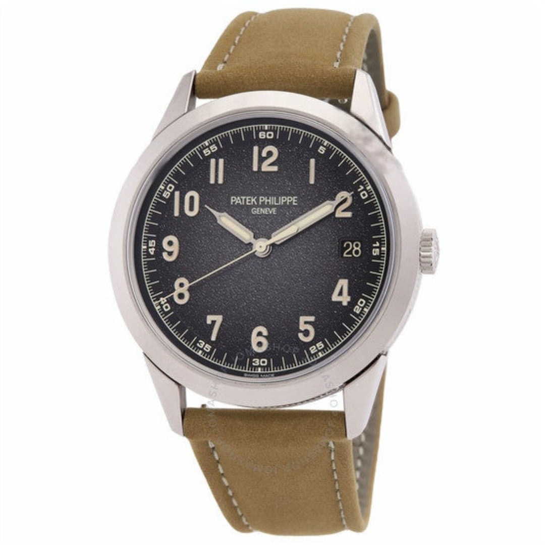 Watch with brown strap and black dial on a white background