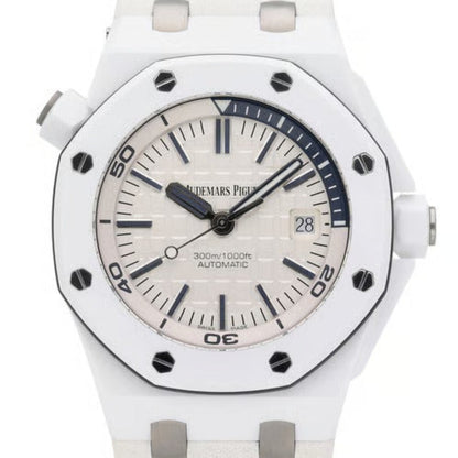 Luxury watch with white strap and silver case on a white background