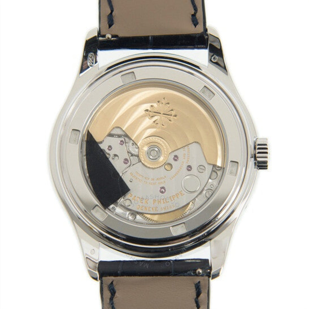 Watch back cover with visible brand name on a white background