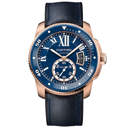 Cartier watch with blue face and rose gold case on a white background