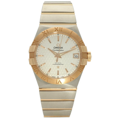 Gold and silver watch with Omega brand on a white background
