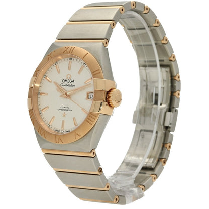 Luxury Omega watch with gold and silver band on white background