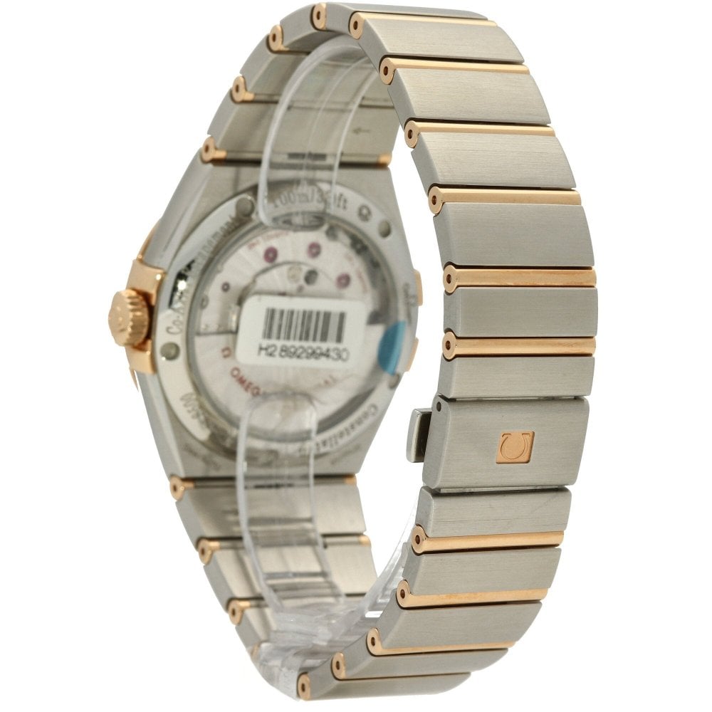 Luxury watch with a metallic band on a white background