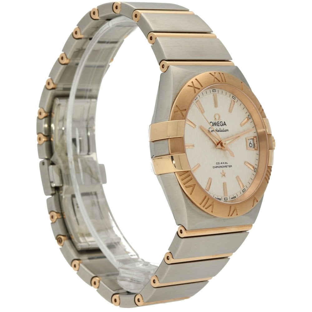 Luxury watch with silver and gold band on a white background