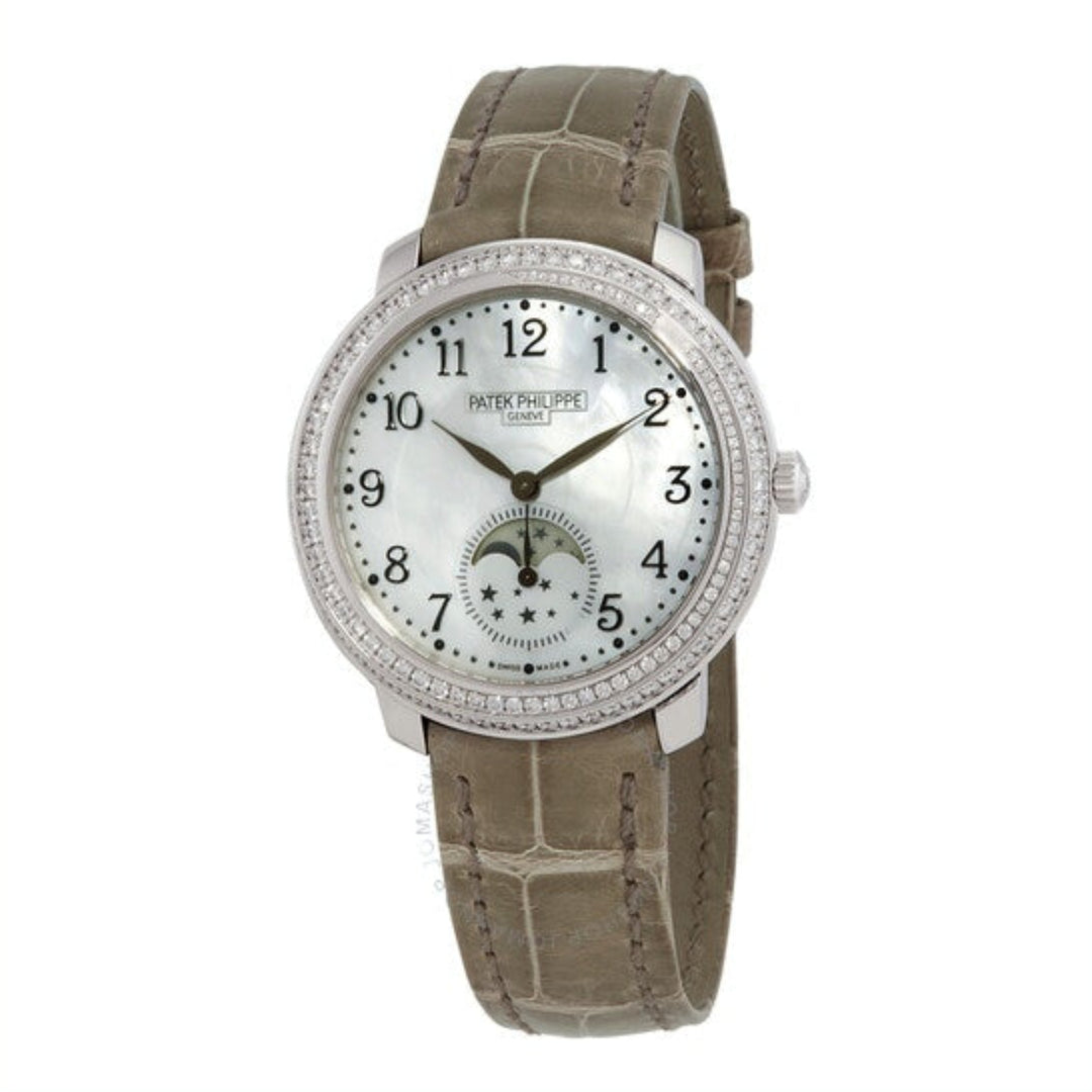 Patek Philippe watch with a brown leather strap on a white background