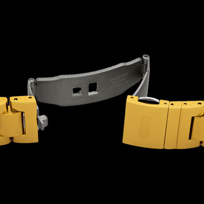 Rado R12413314 – Men's Original Automatic Watch, 35mm Yellow Gold CVD Stainless Steel Case & Bracelet with Gold Dial, Blue Simili Stone Markers, Day-Date Display, 80-Hour Power Reserve, 30M Water Resistance