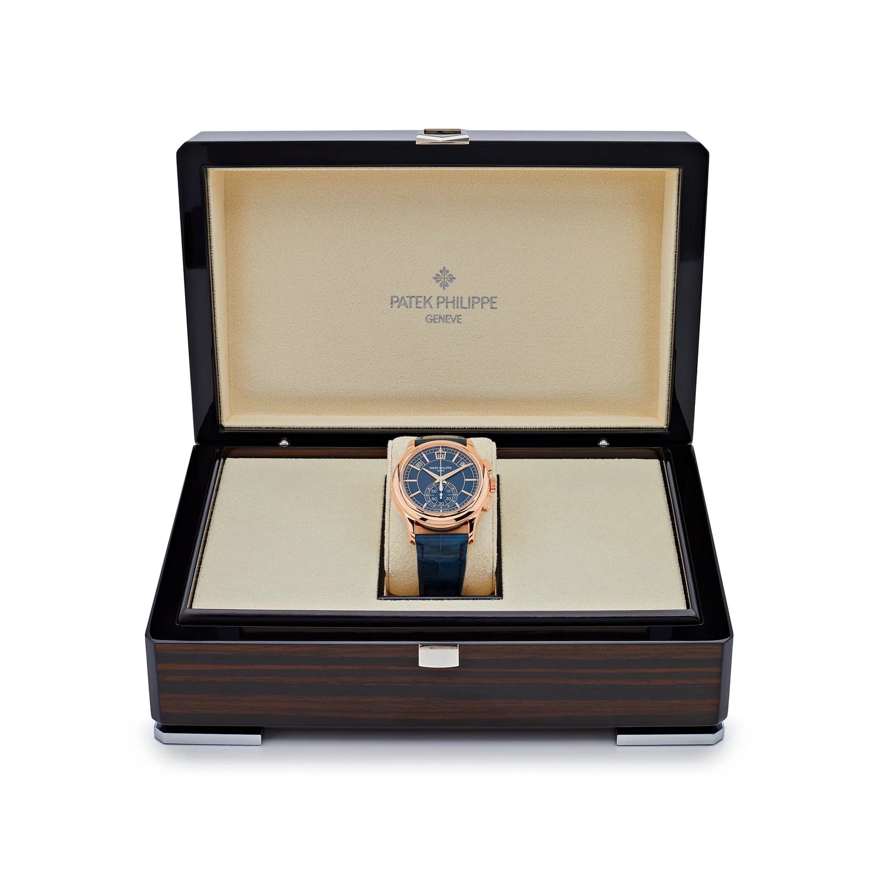 Patek Philippe watch in a wooden box on a white background