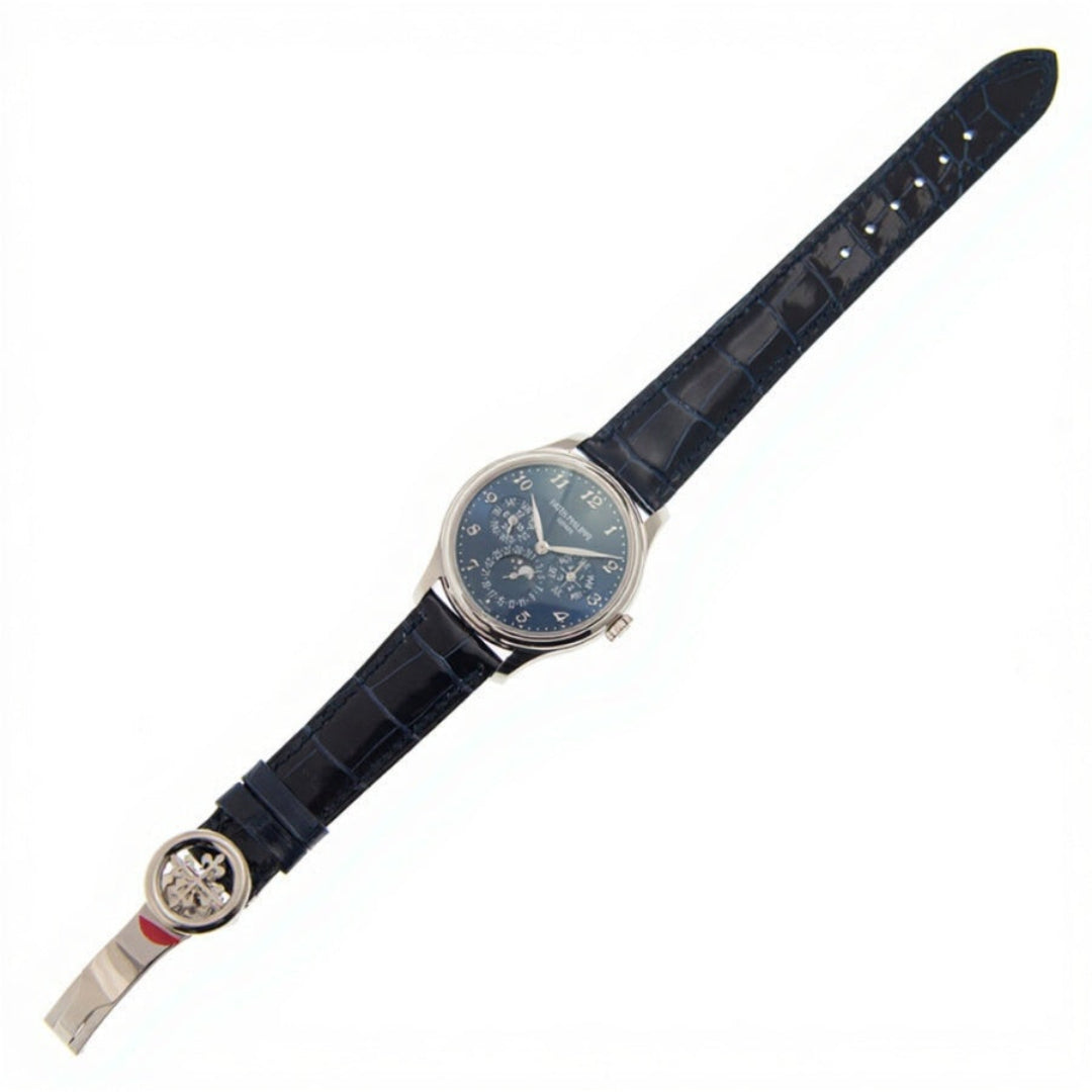 Watch with a dark blue strap on a white background