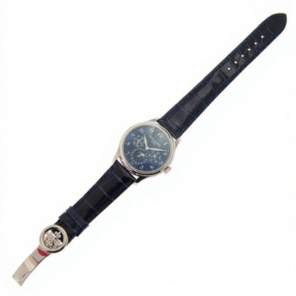Watch with a dark blue strap on a white background