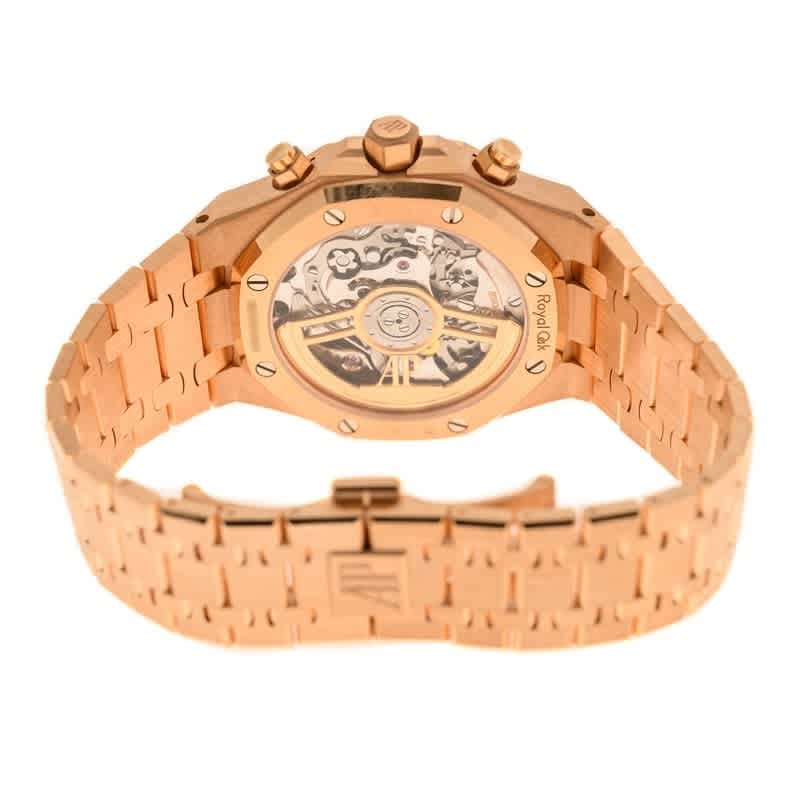 Rose gold watch with visible brand name on a white background