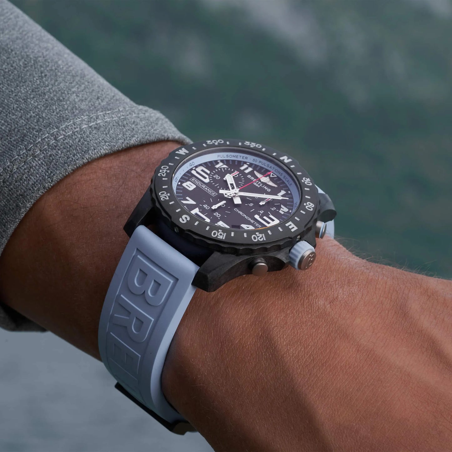 Breitling Professional X82310281B1S1 – 44mm Men's Swiss Quartz Chronograph Watch with Black Dial, Light Blue Rubber Strap & Ultralight Breitlight Case