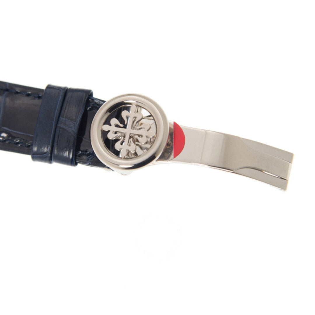Navy leather strap with a silver clasp on a white background