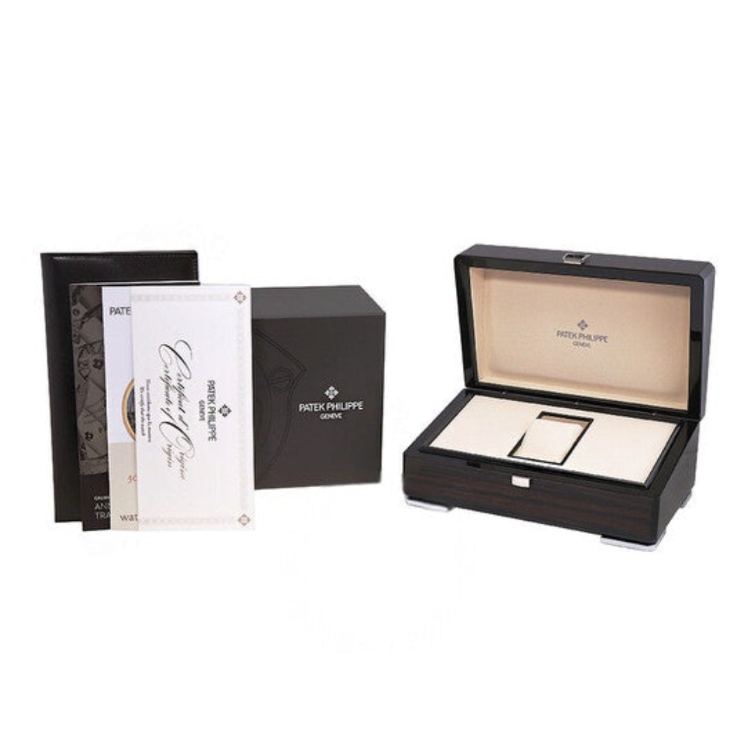 Patek Philippe jewelry box with accessories on a white background